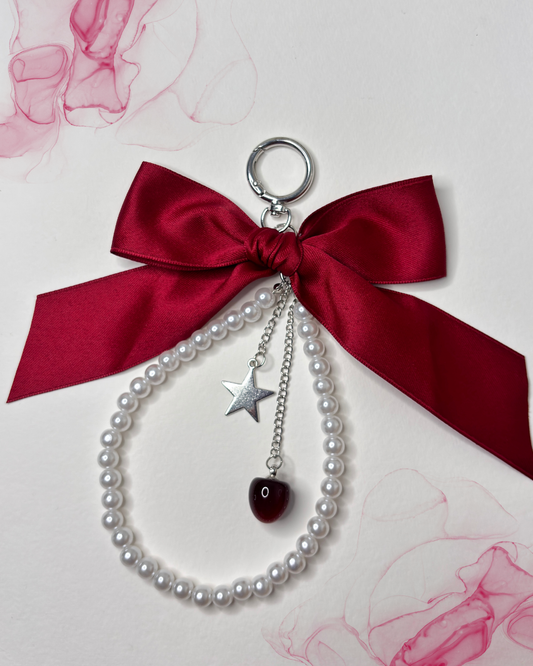 Dark Cherry Decoded — Burgundy Bow Pearl Cherry Star Charm